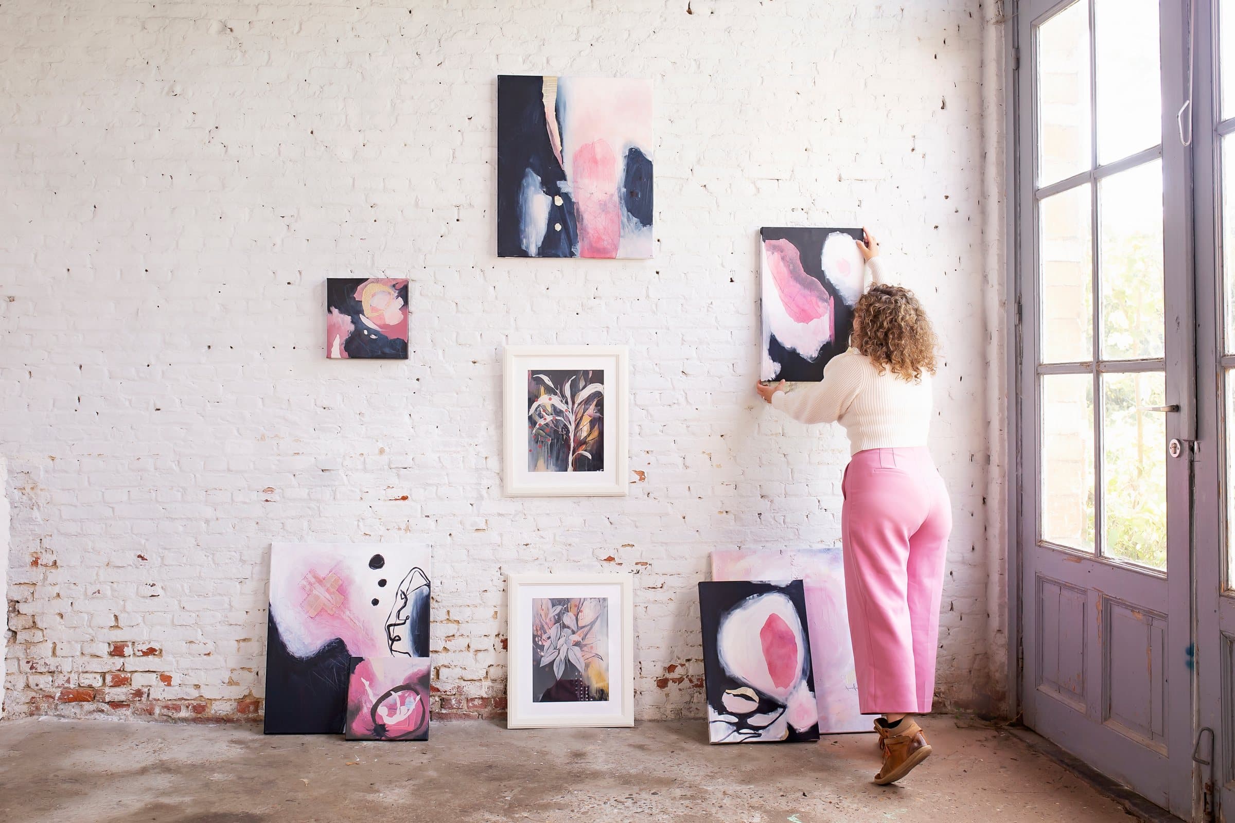 Mieke Fleurackers painting in her studio in Baasrode