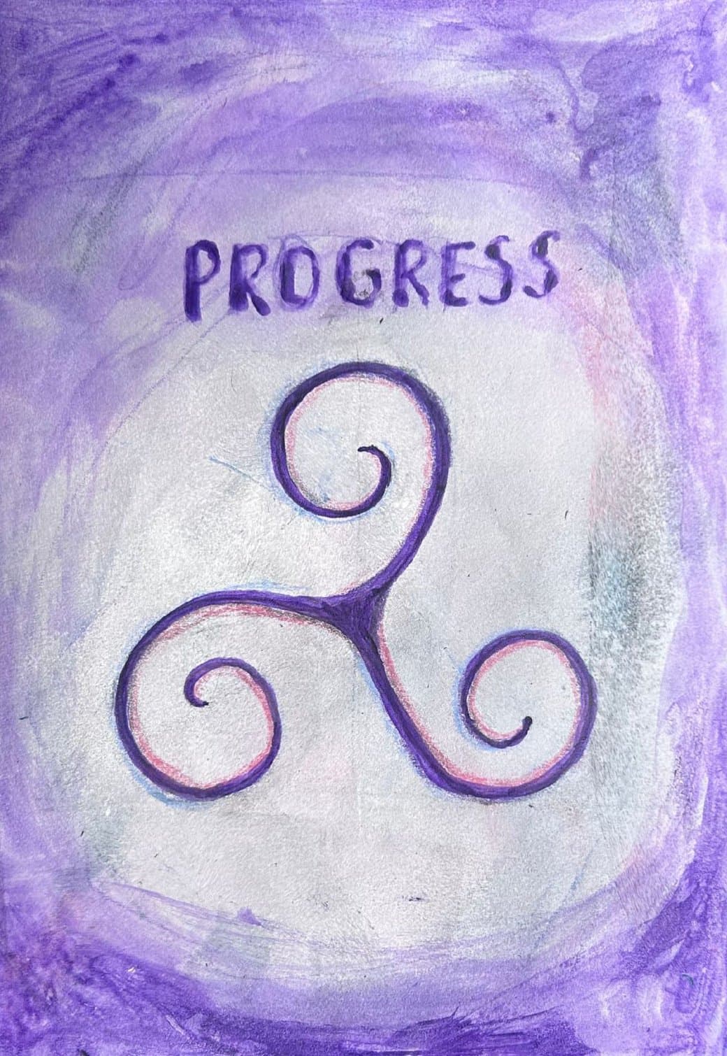 A triskelion symbol being painted by Mieke